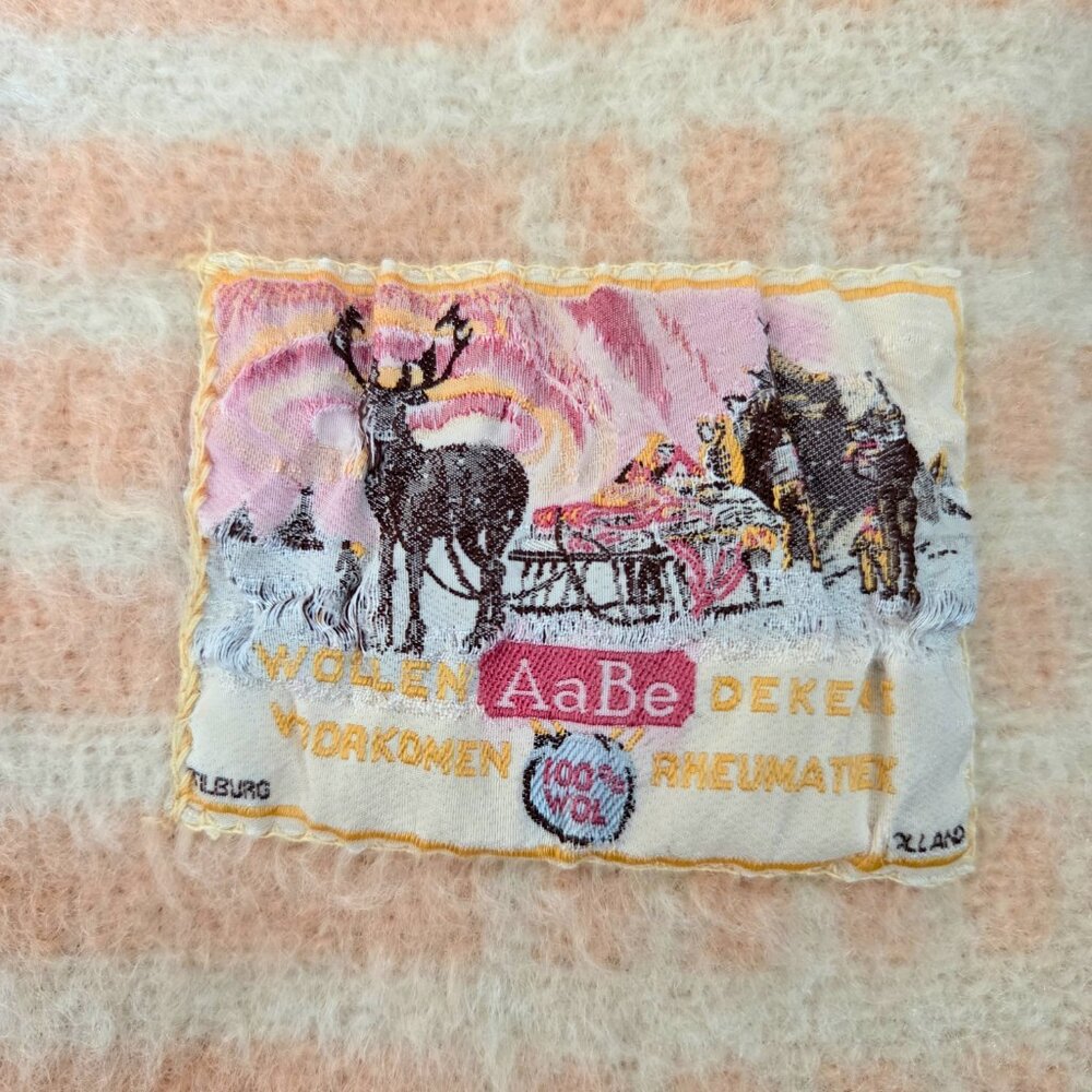 AeBe Holland 100% wool baby wool blanket peach and cream colors.